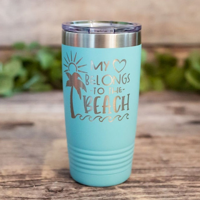 https://3cetching.com/wp-content/uploads/2020/09/my-heart-belongs-to-the-beach-engraved-stainless-steel-tumbler-beach-mug-gift-i-love-the-beach-mug-5f5fc305.jpg