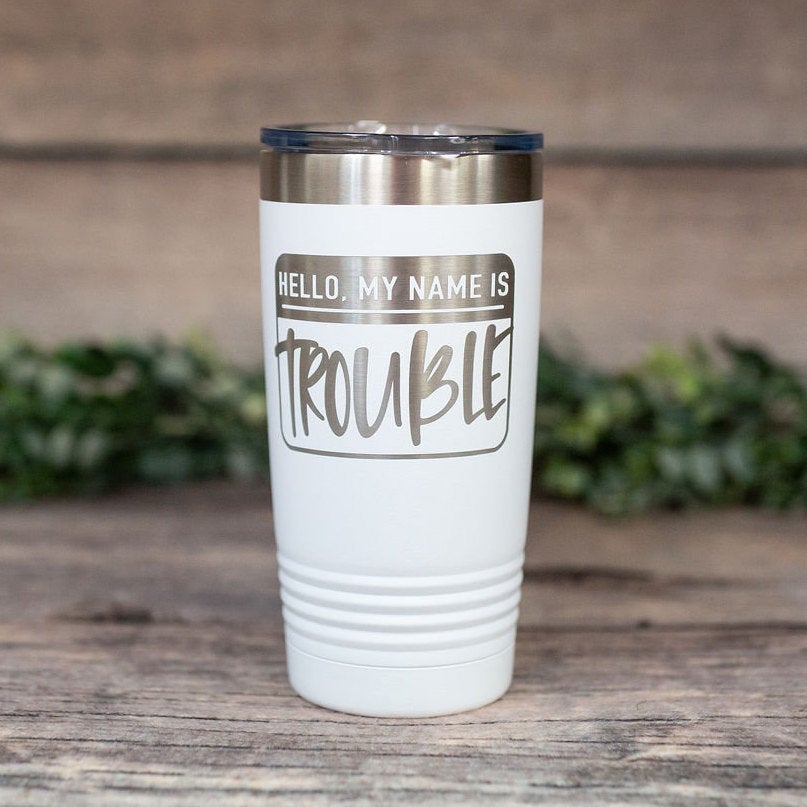 https://3cetching.com/wp-content/uploads/2021/07/hello-my-name-is-trouble-engraved-stainless-steel-tumbler-funny-best-friend-travel-mug-funny-gift-mug-for-friend-60f723da.jpg