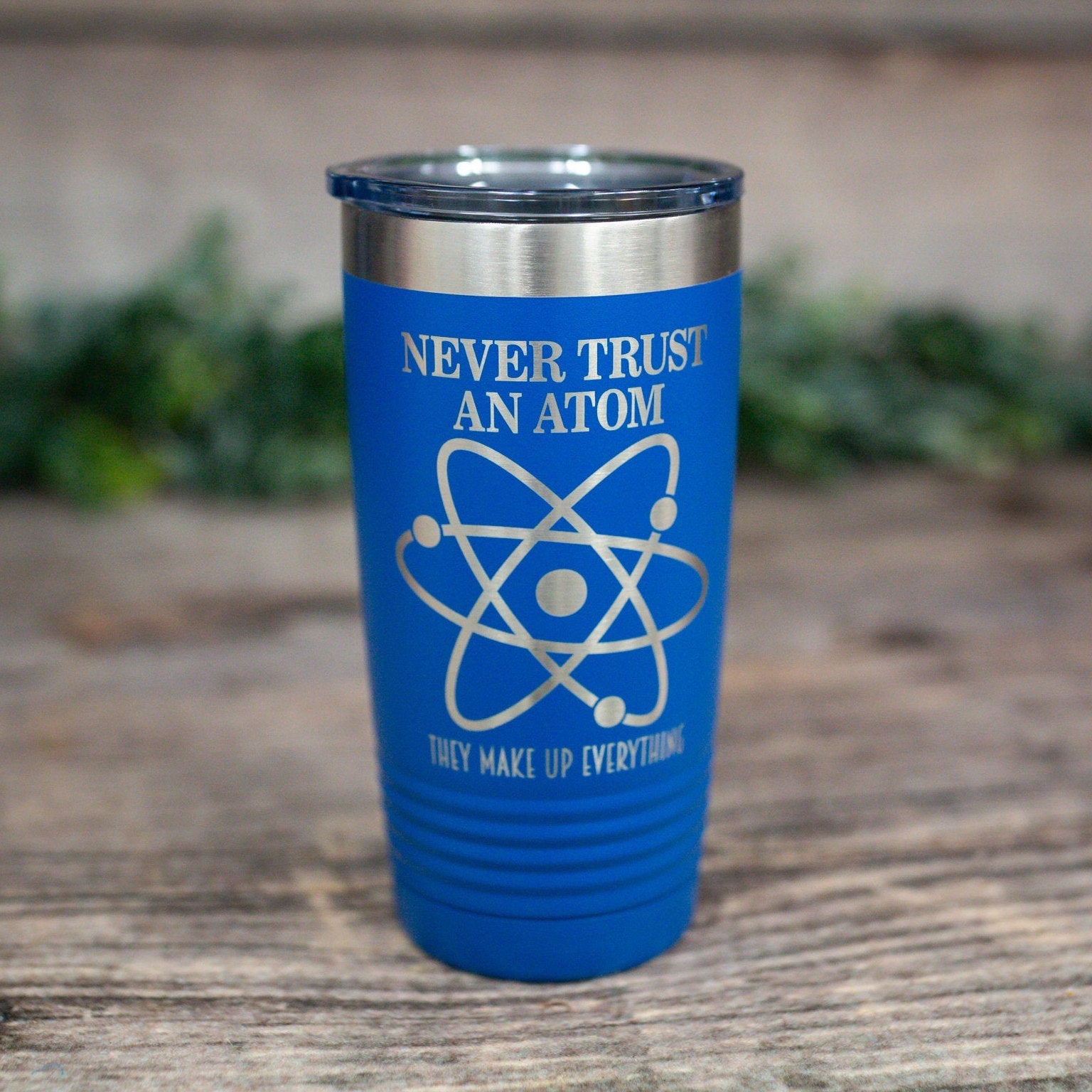 https://3cetching.com/wp-content/uploads/2021/07/never-trust-an-atom-they-make-up-everything-engraved-stainless-steel-tumbler-funny-gift-for-him-personalized-science-tumbler-60f72a77.jpg