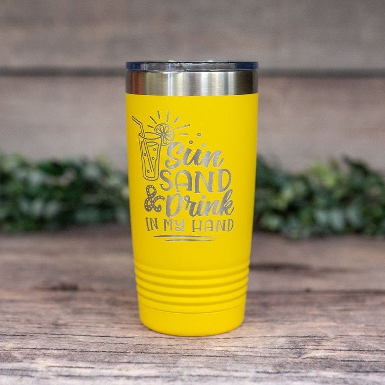 https://3cetching.com/wp-content/uploads/2021/07/sun-sand-and-drink-in-my-hand-engraved-stainless-steel-tumbler-stainless-cup-vacation-tumbler-60f72752.jpg